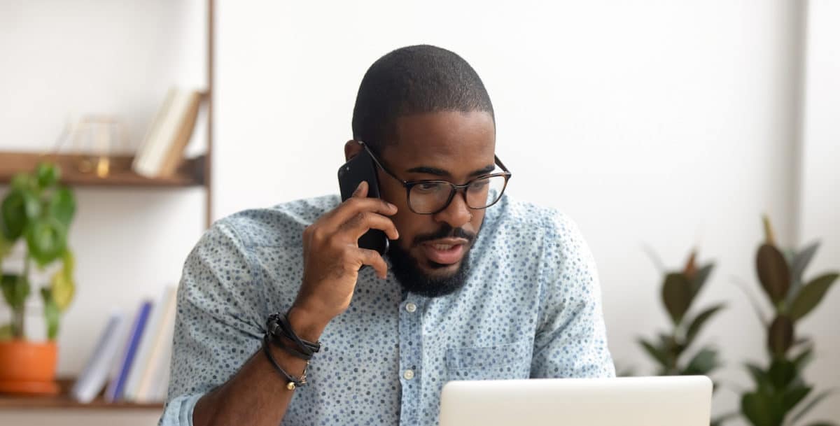 man preparing for a phone interview by alllegiance staffing