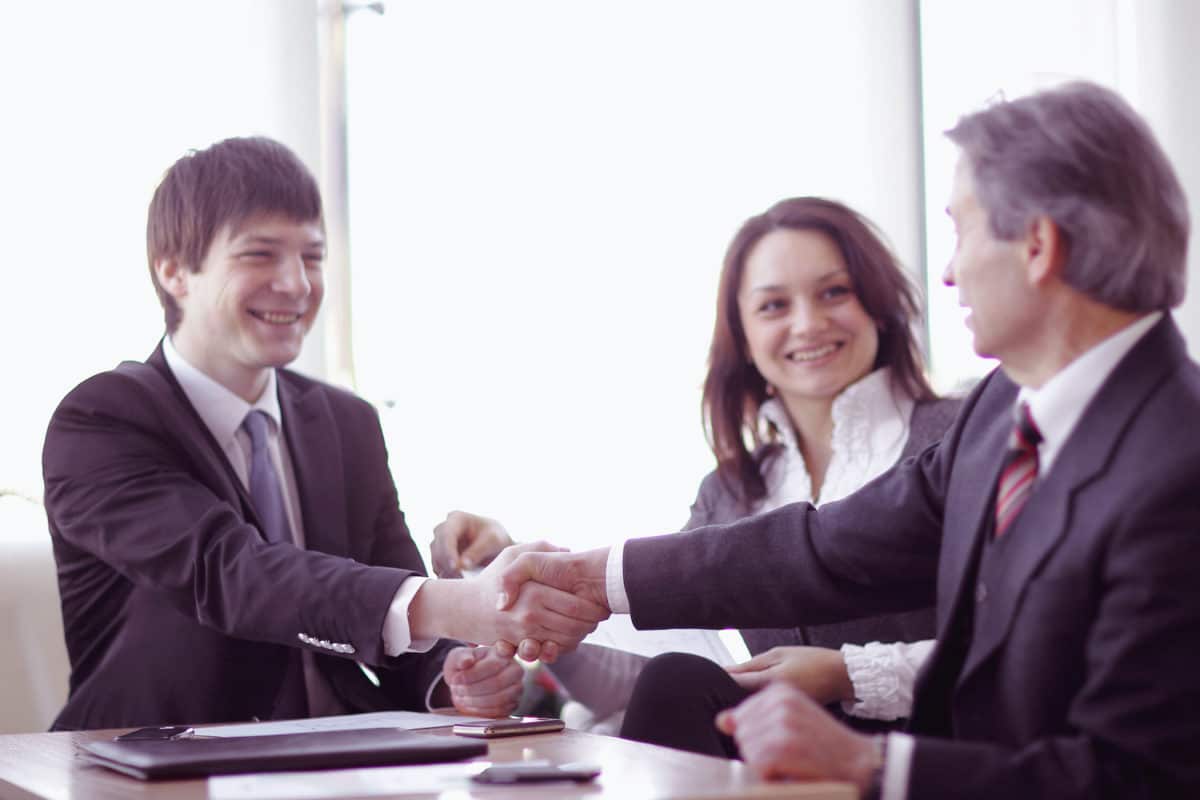 Young man interviewing for job at a staffing agency