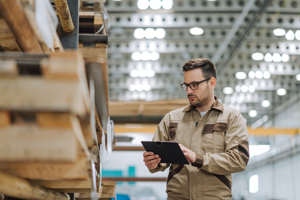 A warehouse worker on the job by allegiance staffing.