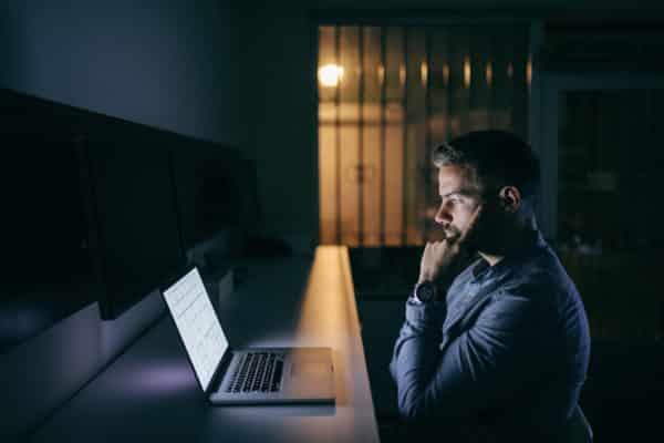 Young man working in an overnight job by allegiance staffing a leading staffing agency in houston, texas.