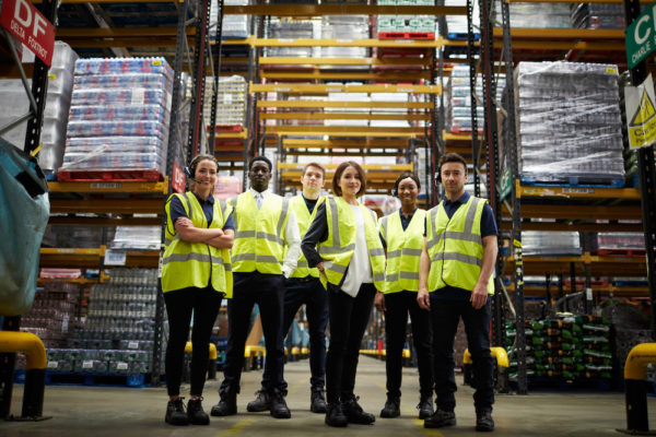 Warehouse workers supported by an effective staffing plan that fuels company growth