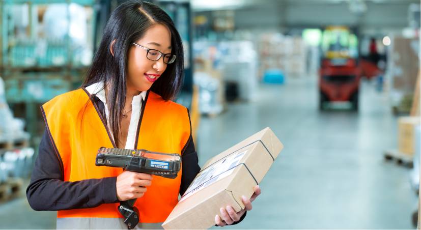 warhouse worker scanning package