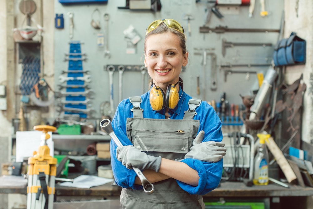 Maintenance worker on the job after learning what jobs to get with a GED