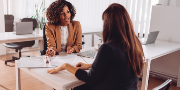 Employer discussing benefits with a temporary employee