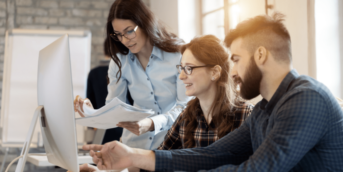 An employer and employees working out a plan to improve labor productivity