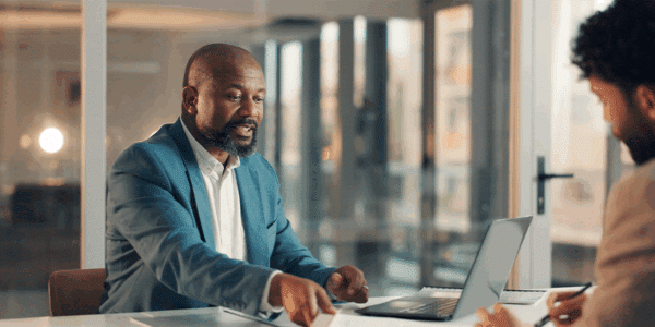 Featured Image Alt Text Tag Employer talking to another manager about how to maximize their talent mix