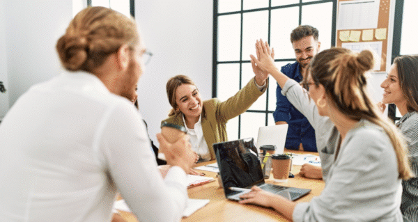 Temporary worker successfully contributing to her new team in an office setting